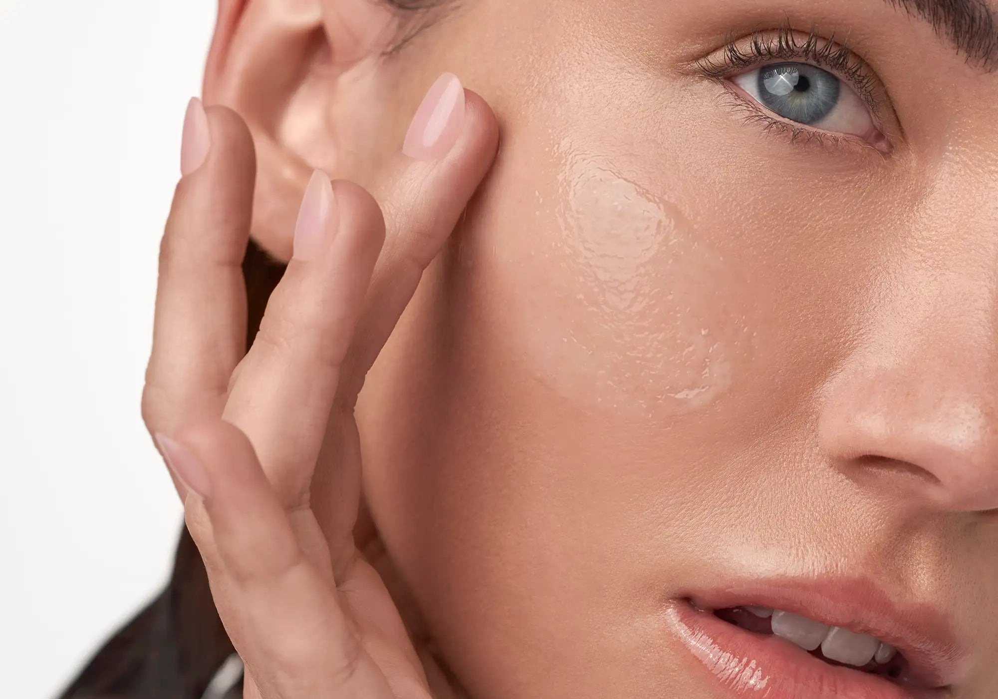 Close up of model & Gentle Cleansing Balm Texture on cheek