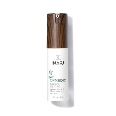 Skincare bottle with wooden cap on a white background