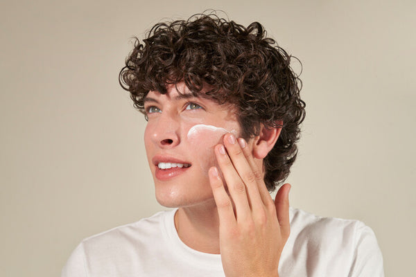 woman with Clear Cell medicated acne lotion