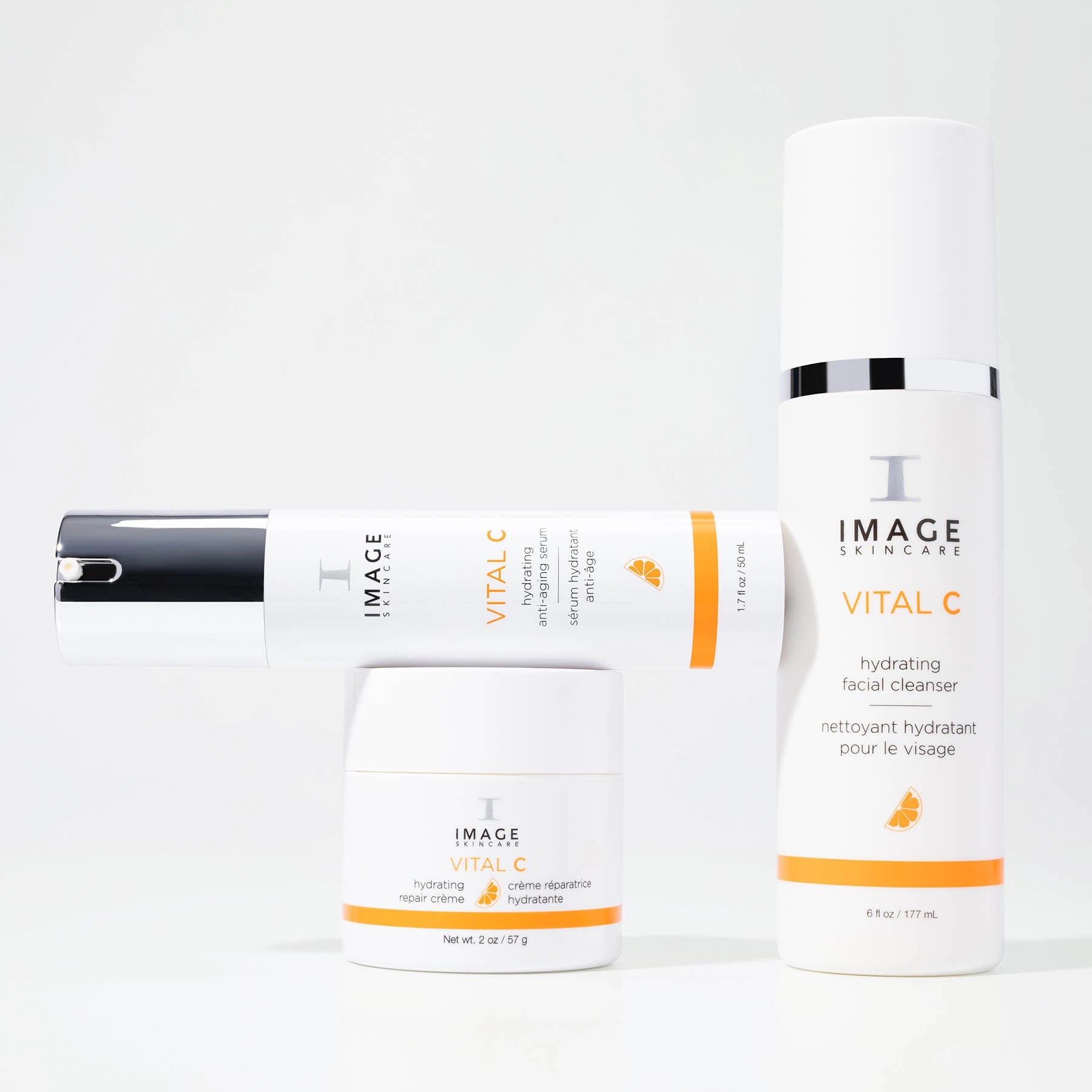 Image Skincare products including a cleanser, moisturizer, and serum on a white background