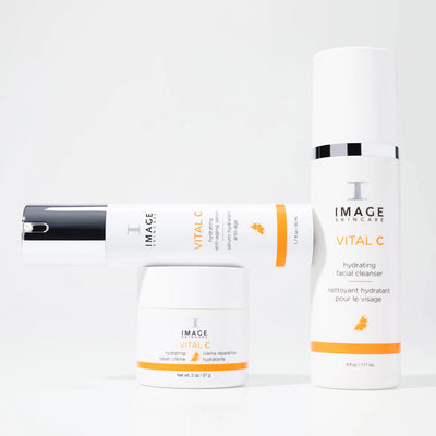 Image Skincare products including a cleanser, moisturizer, and serum on a white background