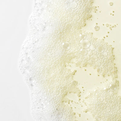 Close-up of bubbles in a liquid on a gradient background