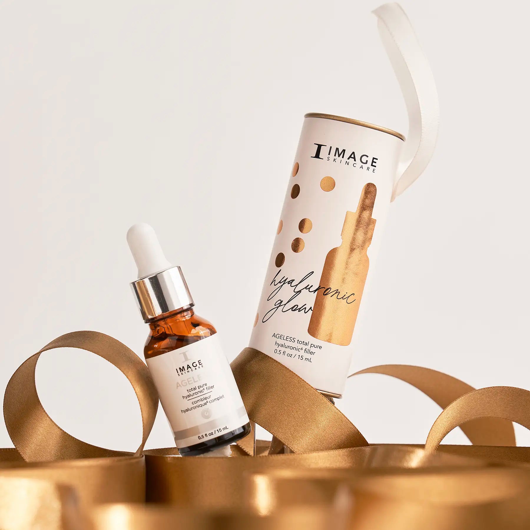package and product on gold ribbons