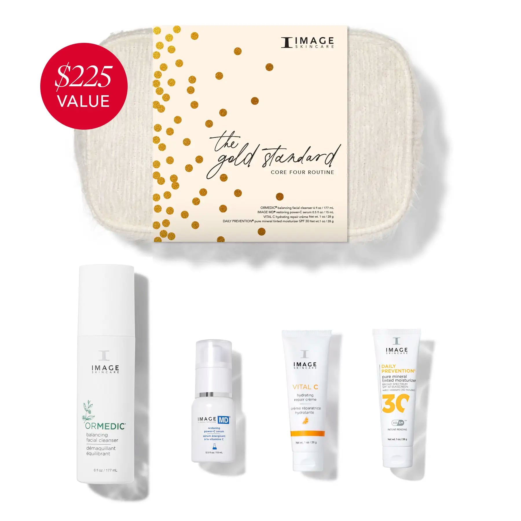 The gold standard kit with bag and products on a white background