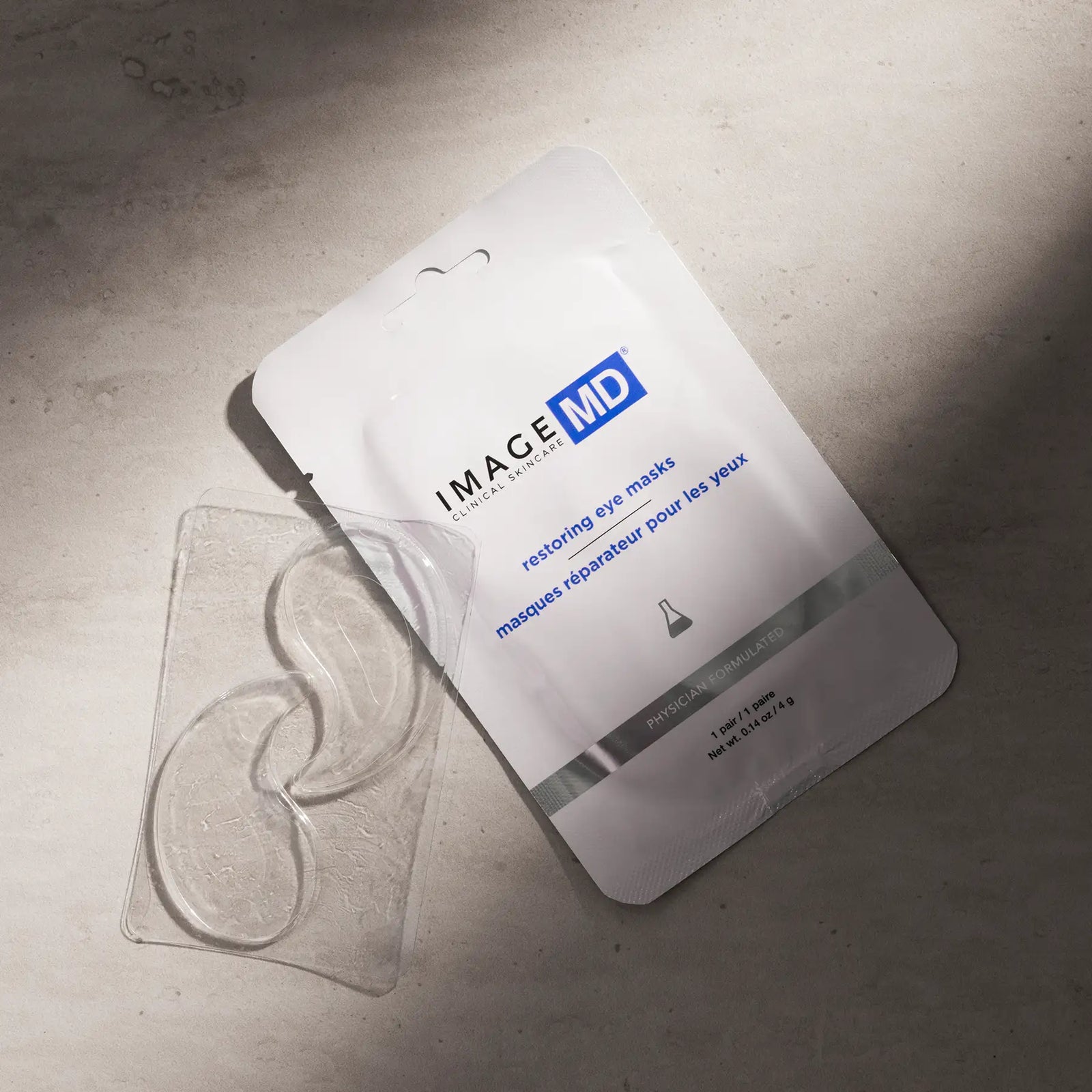 Image MD eye mask packaging on a gray surface