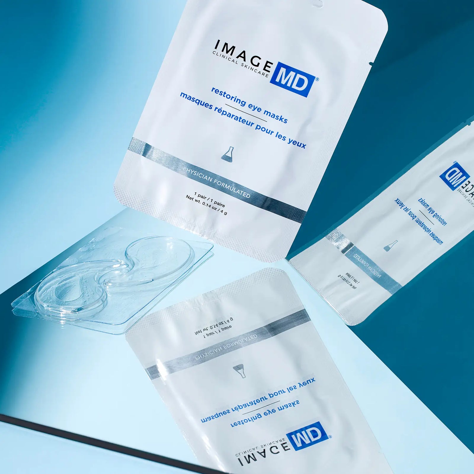 IMAGE MD eye mask packages on a blue background