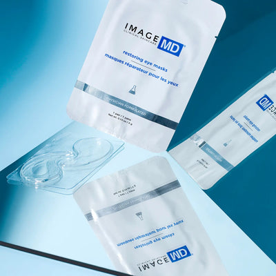 IMAGE MD eye mask packages on a blue background