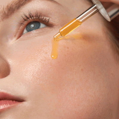 gif of models applying retinol products to face