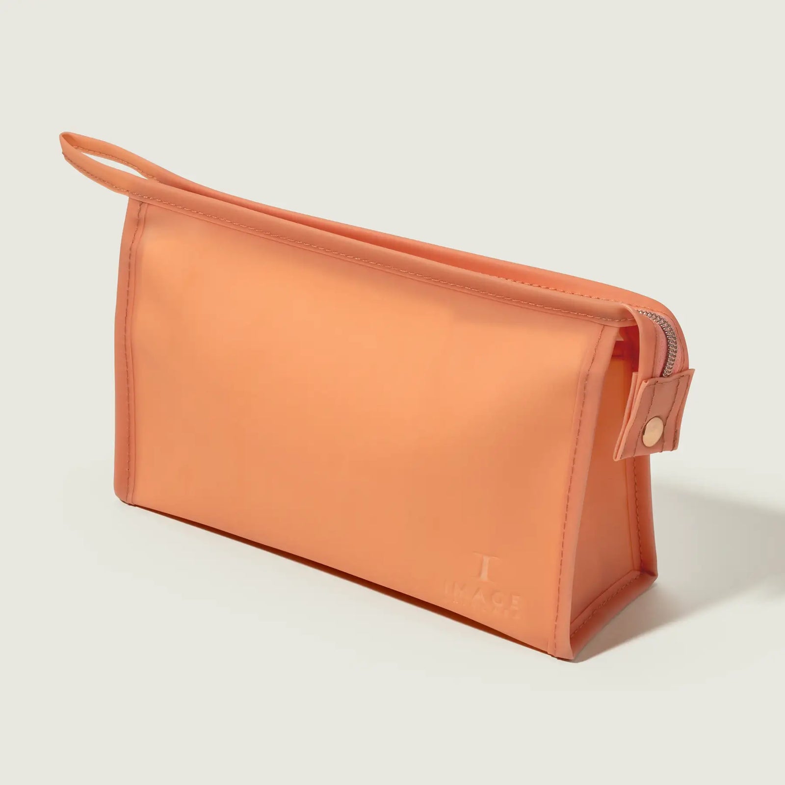 orange bag on beige background