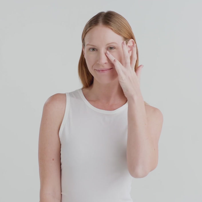 video of model applying product on under eye