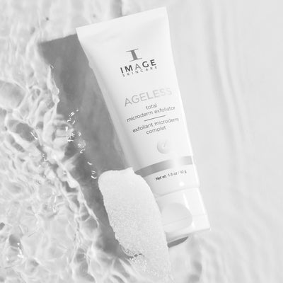 Ageless microderm product bottle floating on water