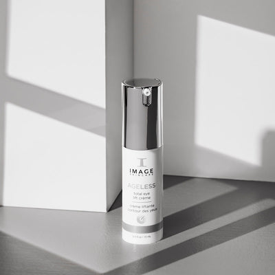 Ageless eye lift creme bottle on gray background