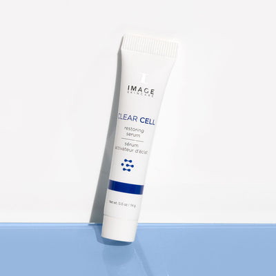 clear cell restoring serum travel size on light background