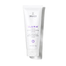 White skincare tube labeled 'ILUMA' on a white background