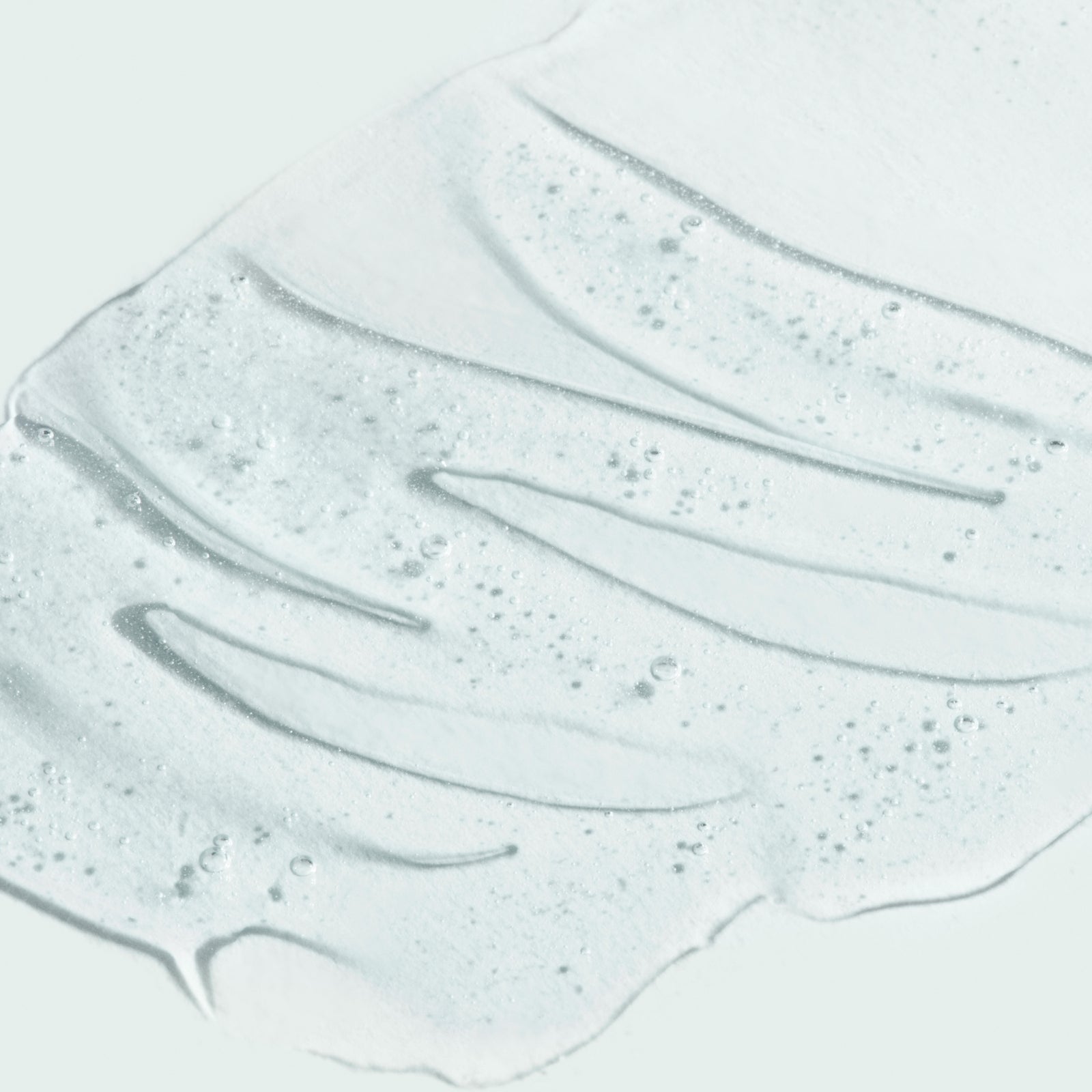 close up texture shot of cleanser on white background